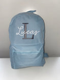 Load image into Gallery viewer, Baby Blue Embroidered Backpack - Dark Grey Initial - White Beauty Font