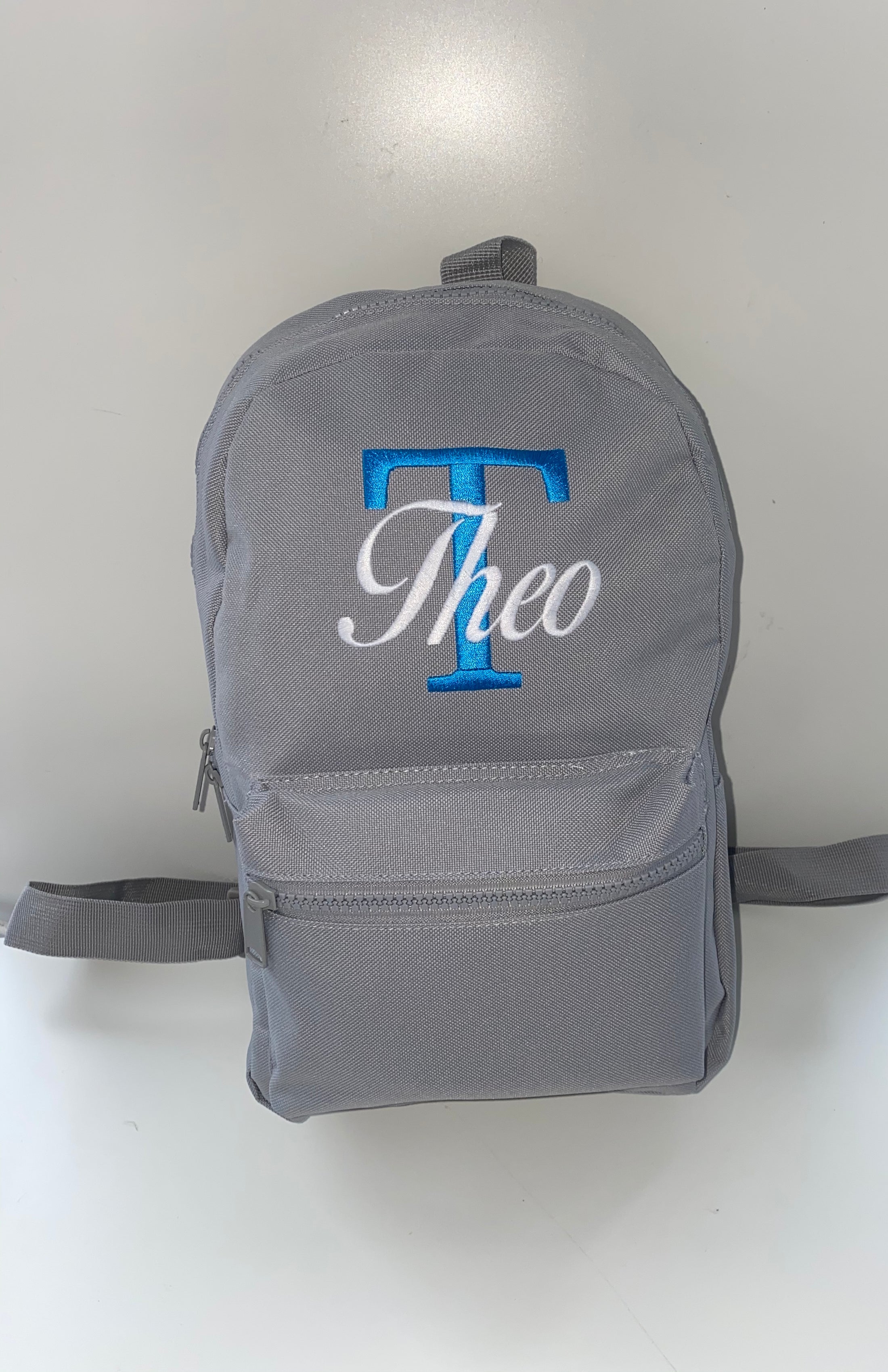 Embroidered Grey Backpack - Blue Initial - White Birds of Paradise Font