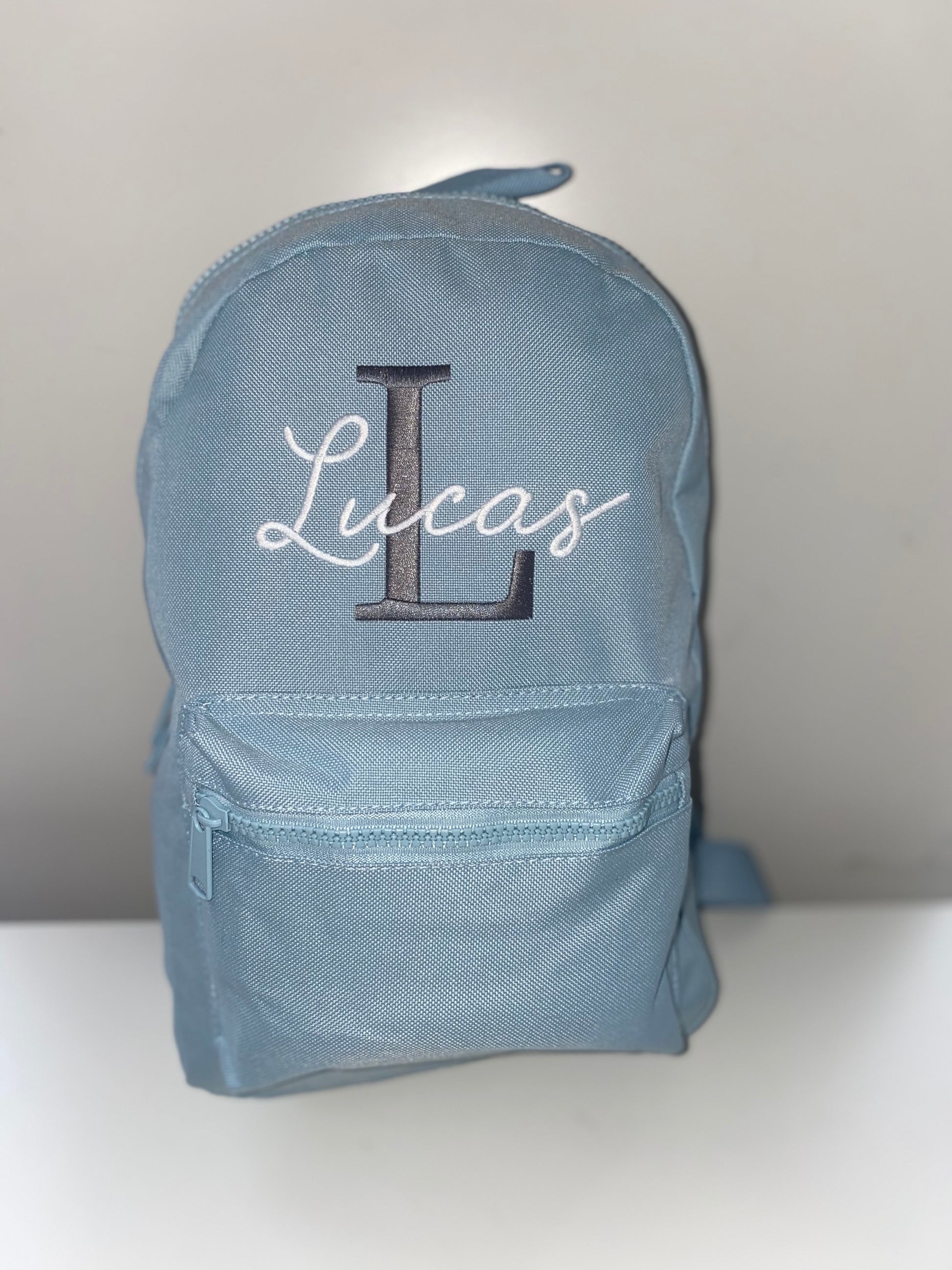 Baby Blue Embroidered  Backpack - Dark Grey Initial - White Beauty Font