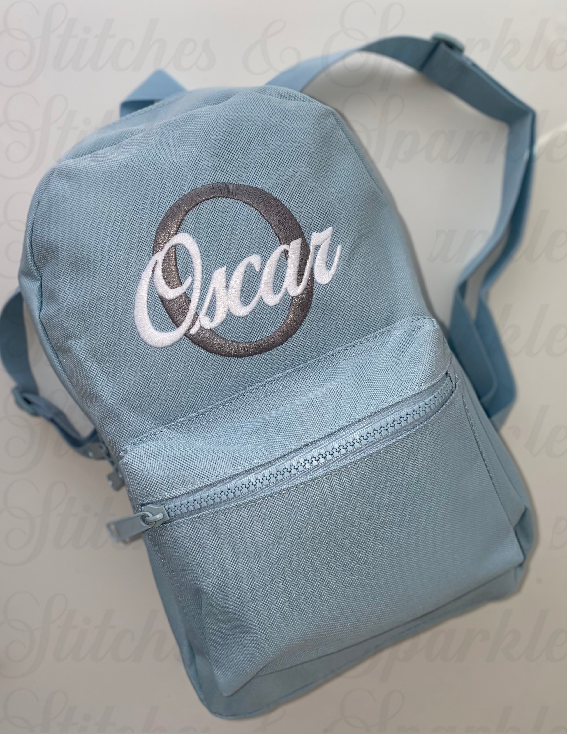 Blue Backpack | Birds of Paradise Font | Grey Initial | White Name