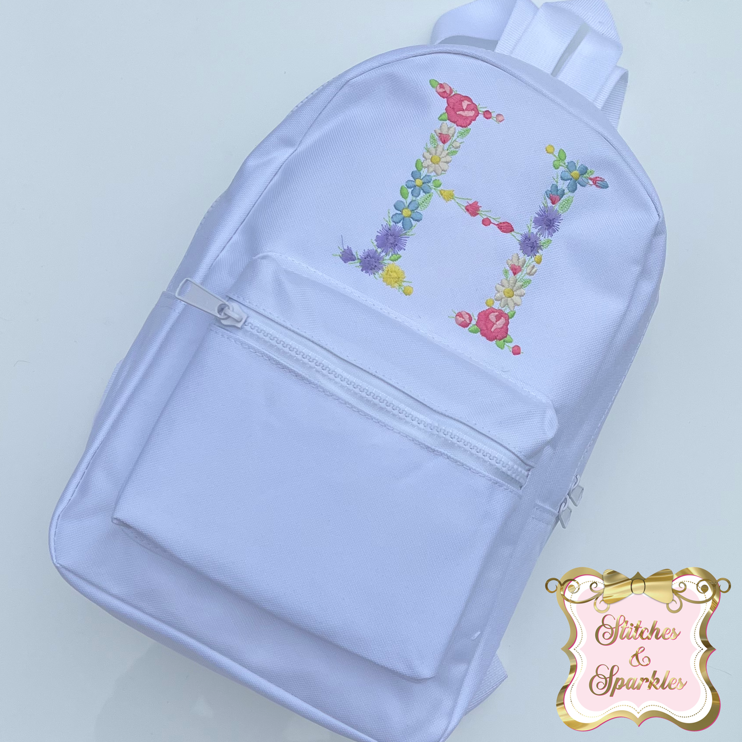 Embroidered Floral Initial Backpack